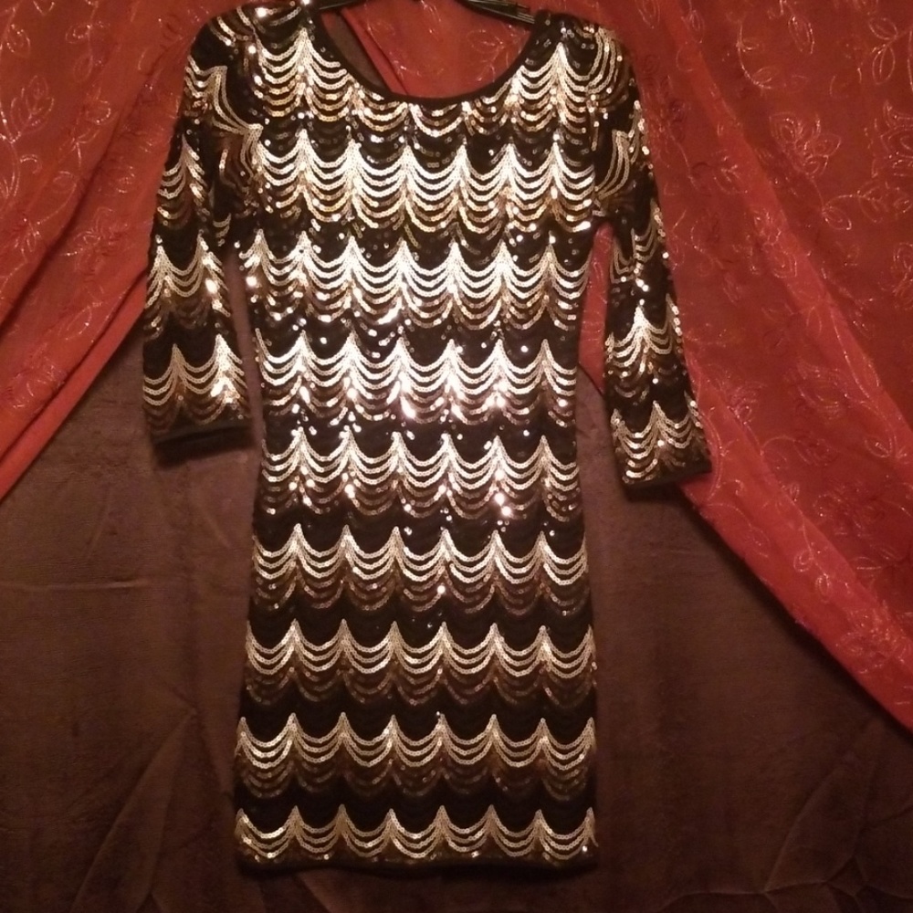 Black and gold mini dress